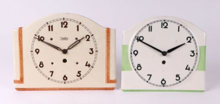 A French enamel wall clock with Arabic numerals and fitted with a 30-hour movement, 21cms wide;
