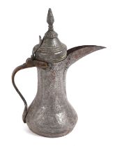 A Turkish / Islamic tinned copper dallah coffee pot, 29cms high.