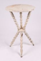 A Victorian gypsy table on bobbin turned legs, 42cms diameter.