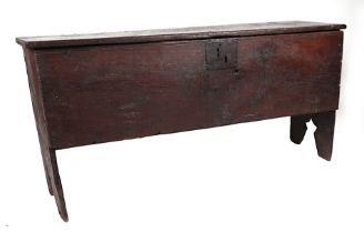 A 17th century oak six-plank coffer, 130cms wide.