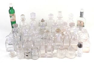 A large quantity of glass scent and perfume bottles.