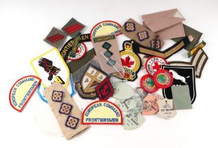 A quantity of military badges
