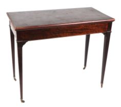 An Edwardian mahogany card table on square tapering legs, 90cms wide.