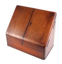 An Edwardian walnut table top stationery box with fitted interior, 32cms wide.