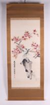 A Chinese watercolour scroll painting depicting a carp, signed, 125 by 54cms.