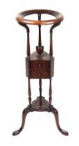 A George III mahogany tripod wig stand or wash stand with circular wash bowl, on three baluster form