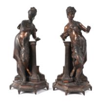 A pair of spelter figures depicting classical ladies, 37cms high (2).