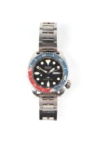 A vintage Seiko Quartz 150m divers wrist watch, ref. 7548-700B having a Pepsi bezel, black dial with