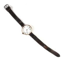 A silver cased trench watch the white enamel dial with Roman numerals.