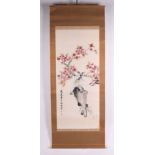 A Chinese watercolour scroll painting depicting a carp, signed, 125 by 54cms.