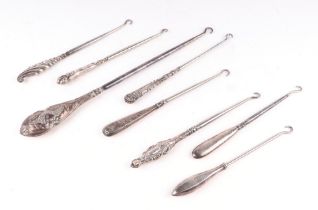 A small quantity of Victorian and later silver handled button hooks, various dates and makers.