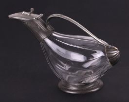 A French pewter mounted glass carafe, 26cm long.