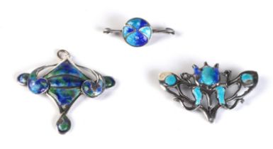An Art Nouveau silver and enamel bar brooch; together with a similar white metal and enamel brooch