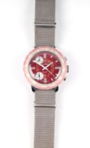A Globa Sport vintage chronograph wristwatch, the maroon dial with two subsidiary seconds dials