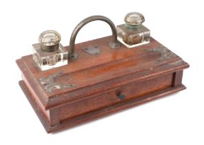 A George V oak desk stand with two glass inkwells, pen tray and a single drawer, 31cm wide; together