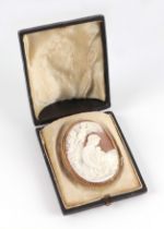A late 19th century carved shell cameo brooch depicting Mother and Child with winged angels in the