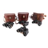 A pair of WWII Taylor & Hobson Mk. 2 binoculars, no. 143850, cased; together with two other pairs of