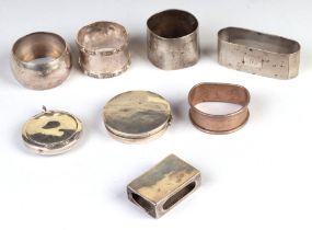 A small group of silver items to include napkin rings, matchbox cover and compacts, various dates