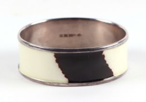 A Scandinavian silver and two tone purple and white enamel bangle, makers mark 'AJ', 7cms