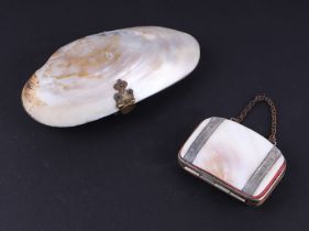 A mother of pearl shell purse, 11cms long; together with another similar, 6cms wide (2).