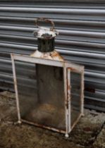 Railway interest. A railway white painted metal and glazed lantern with chimney and carrying handle,