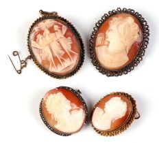 Four carved shell cameo brooches in yellow coloured metal and silver mounts (4).