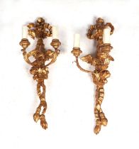 A pair of giltwood twin-arm wall lights, 60cms high (2). Condition Report Both in good condition