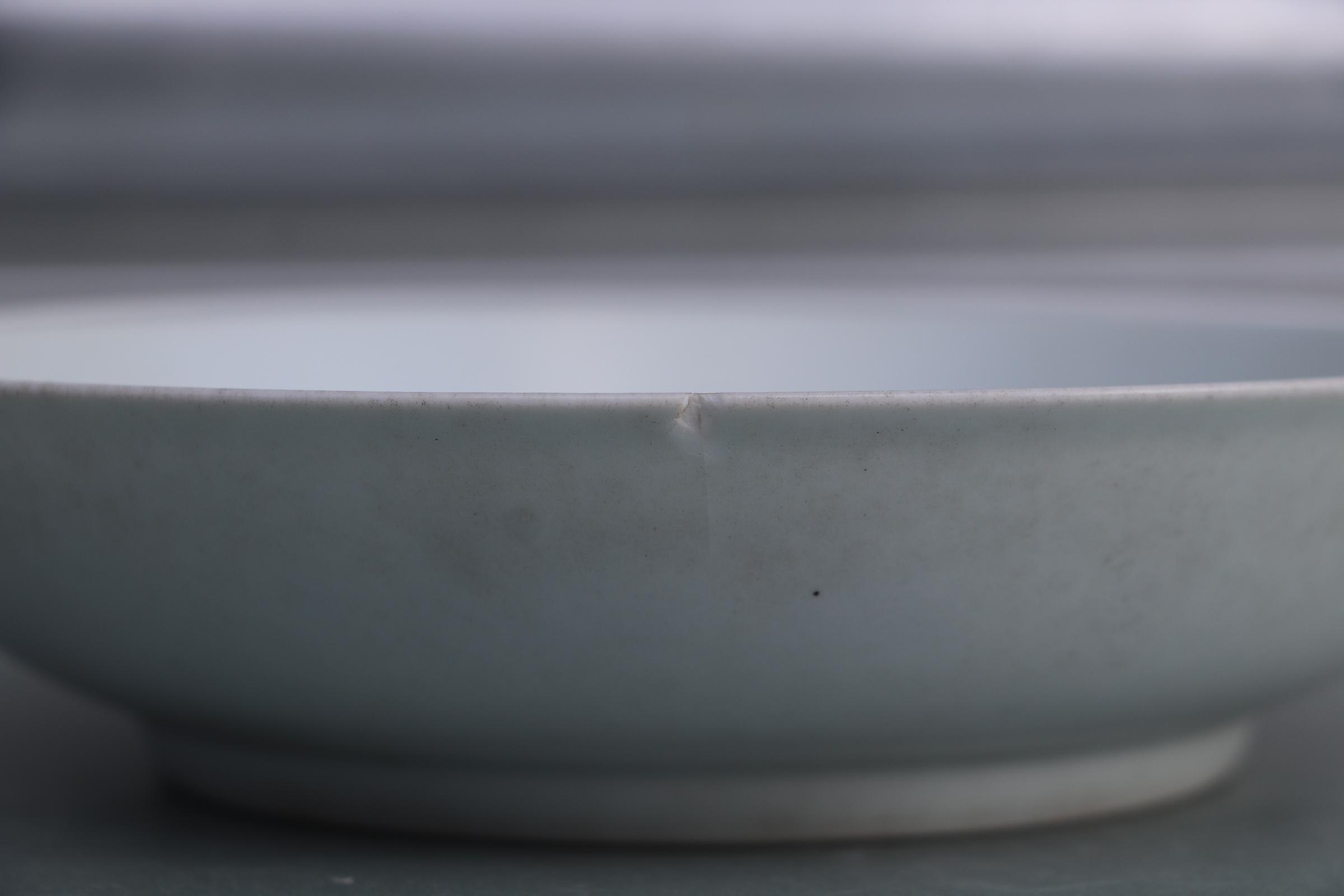 A Chinese white glazed shallow footed bowl, blue six character mark to base, 18cms diameter. - Image 9 of 9
