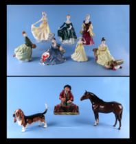 A group of Royal Doulton figures to include At Ease HN 2473, In the Stocks HN 2163 and Janine