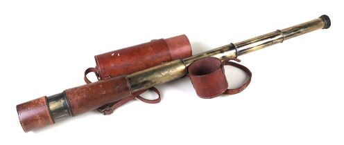 A very long four draw brass telescope by J H Steward of 406,66,456 Strand, 54 Cornhill London, in