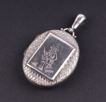 A Victorian silver locket, the cover engraved with the figure of a drummer boy, 21g, 4.5cms wide.