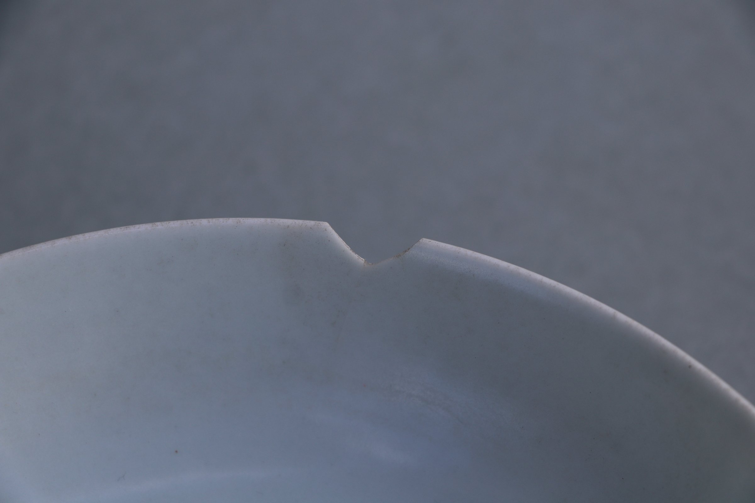 A Chinese white glazed shallow footed bowl, blue six character mark to base, 18cms diameter. - Image 7 of 9