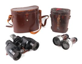 A pair of early 20th century racing binoculars in a leather case dated 1907; together with a pair of