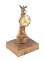 A gilt metal pocket watch stand together with a Duke Railway Timekeeper open face pocket watch