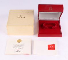 A 1965 red leather Omega box with guarantee and outer cardboard box.