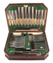 A Walker & Hall six-person silver plated table service in an oak canteen box.