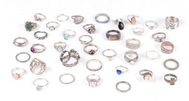 A large quantity of silver and white metal rings, total weight 134g. Condition Report Six of the