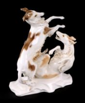 A 1930's Hutschenreuther LHS Borzoi dog group, signed 'MHF', 29cms high. Condition Report In good