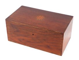 A 19th century crossbanded mahogany box with roundel inlay to the lid, 30cms wide.
