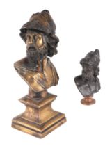 A bronze bust of Mars, 20cms high; together with another similar, 14cms high (2).