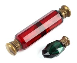 A Victorian cranberry glass double ended scent bottle; together with a faceted green glass scent