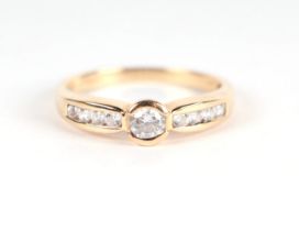 A 14ct gold cubic zirconia dress ring, approx UK size 'O', 2.6g.