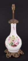 A bronze mounted porcelain table lamp decorated with flowers, 39cms high excluding fittings.