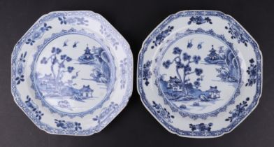 A pair of 19th century Chinese blue & white plates of octagonal form decorated with a river