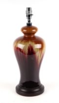 A Chinese style baluster form table lamp decorated in a flambé graduated glaze, 35cms high excluding