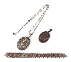 A Victorian silver locket; together with an Indian silver photo locket and a Victorian sliver