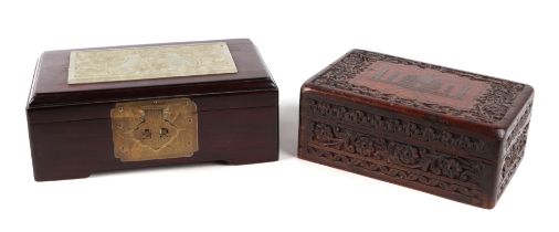 A Chinese hardwood jewellery box the top with inset pierced soapstone panel, 18cm wide together with
