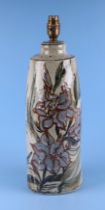 A 1970's Studio pottery table lamp decorated with flowers and foliage, 38cms high. Condition