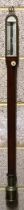 A 19th century Bates of London mahogany and brass ship's stick barometer, 97cms high. Condition