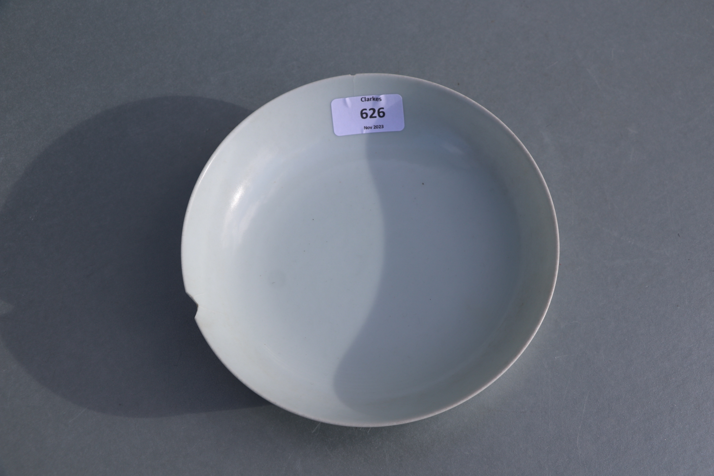 A Chinese white glazed shallow footed bowl, blue six character mark to base, 18cms diameter. - Image 4 of 9